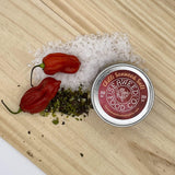 image of hot chilli seaweed salt with fresh hot chillies, sea salt and dried seaweed flakes 