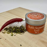 tin of mild chilli seaweed salt with salt, dried herbs and a fresh red chilli 