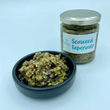 Seaweed Tapenade in a small dish next to the jar
